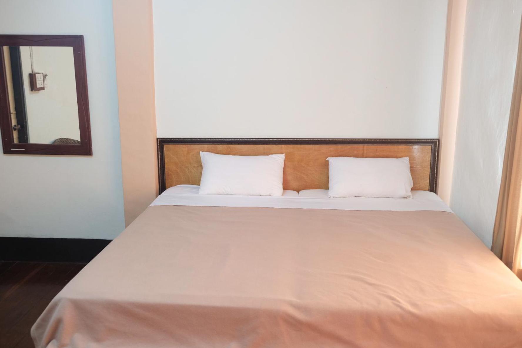Manilath Guesthouse Ban Houayxay Bilik gambar