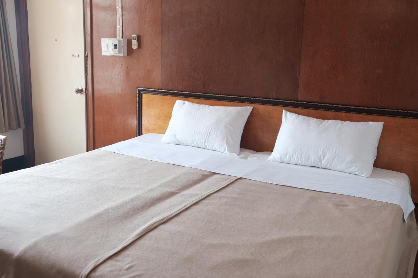 Manilath Guesthouse Ban Houayxay Bilik gambar