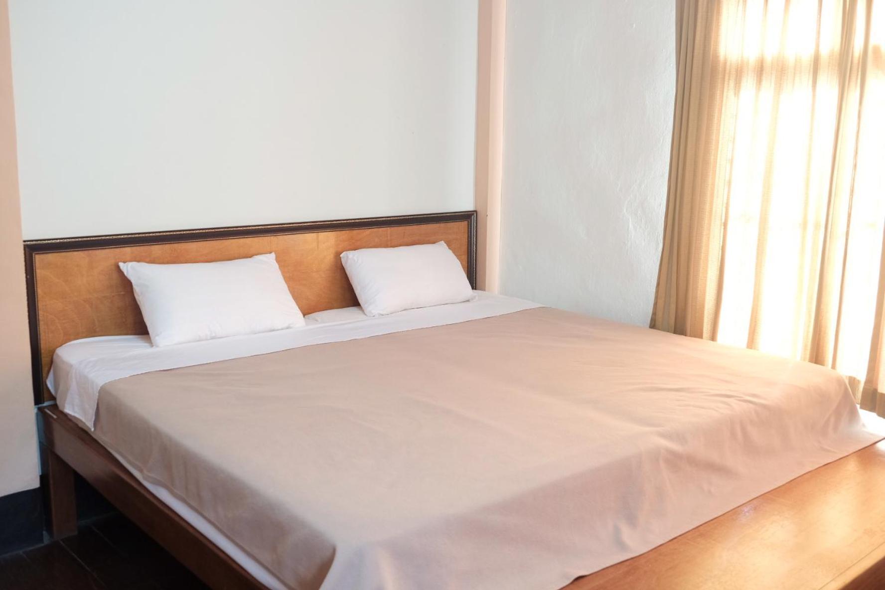 Manilath Guesthouse Ban Houayxay Bilik gambar
